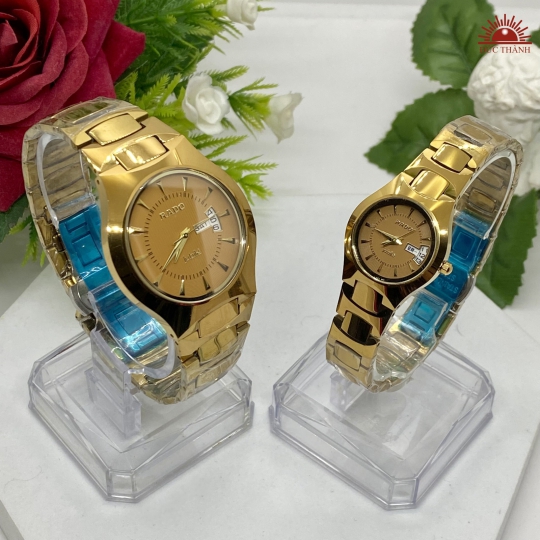 Đồng Hồ Cặp Đôi Đá Đúc Rado JL6053 Full Vàng Đồng
