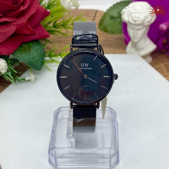 Đồng Hồ DW 0106729  - Vỏ Xi Dây Inox - Full Đen