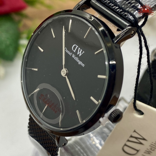 Đồng Hồ DW 0106729  - Vỏ Xi Dây Inox - Full Đen