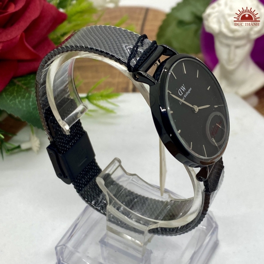 Đồng Hồ DW 0106729  - Vỏ Xi Dây Inox - Full Đen