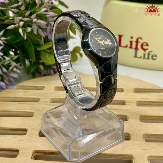 Đồng Hồ Nữ Đá Đúc Rado- Mặt Đen 653GHM