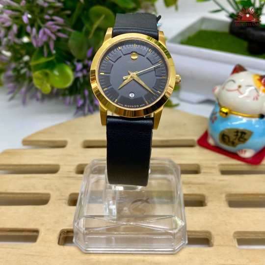 Đồng Hồ Nữ Movado - Mặt Đen Niềng Vàng - 1697