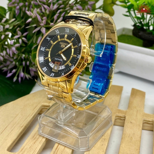 Đồng Hồ Nam Seiko- Mặt Đen Niềng Vàng - SE970527